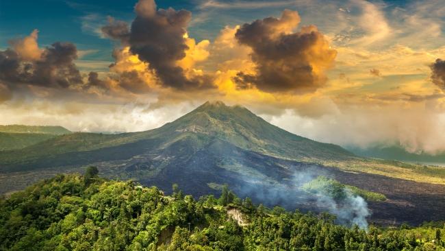 Hike Mount BaturIt’s not all about lazing in the sun or haggling for 'mirror quality' designer gear - at the markets. For some of the best views (and spiritual experiences) in Bali, pull on the hiking boots and trek to the top of Mount Batur, an active volcano that sits at 1717 metres above sea level.Allow around four hours to get to the top, so it’s a very early start if you want to see the sun rise.Sunrise trekking tours can offer the motivation you need to get up for it. While you’re in the ‘hood, soak away any muscle soreness at the Mount Batur Hot Spring.Book here