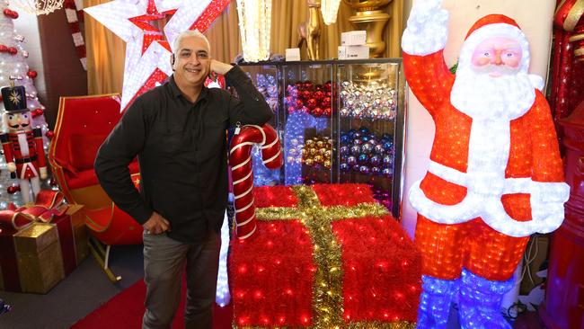 Commercial Christmas Services’ Fred Paikan spreads some festive spirit from his warehouse in Ultimo. Picture: Rohan Kelly