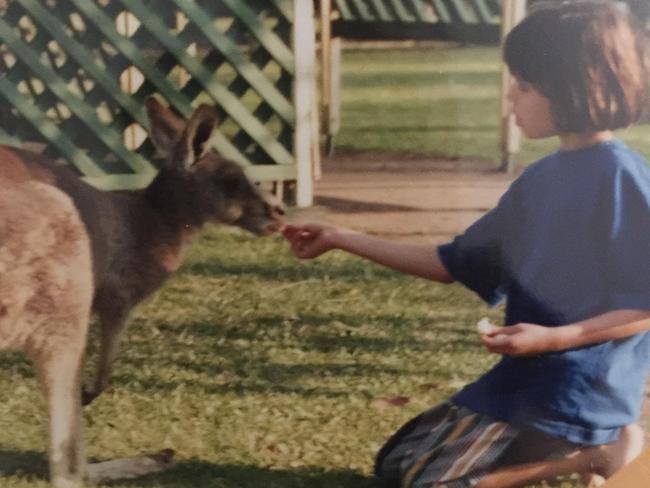 A young Lydia Williams with her pet kangaroo.