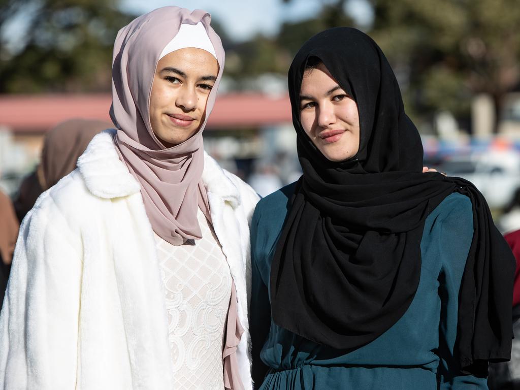 Selma Bensaidi, 17, and Hadjer Bensaidi, 19, both of Greenacre enjoy Eid al-Adha at Roberts Park. Picture: Julian Andrews. Photos can be purchased at newsphotos.com.au