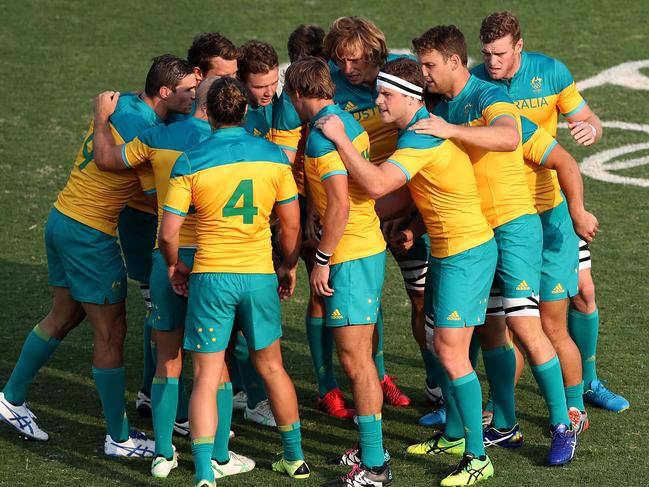 The Australian team get ready for kick off during the 2016 Rio Olympic Men's Rugby Sevens game between Australia and Spain at Deodoro Stadium, Rio. Pics Adam Head