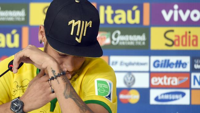 Brazil's forward Neymar gestures during a press conference in Teresopolis.