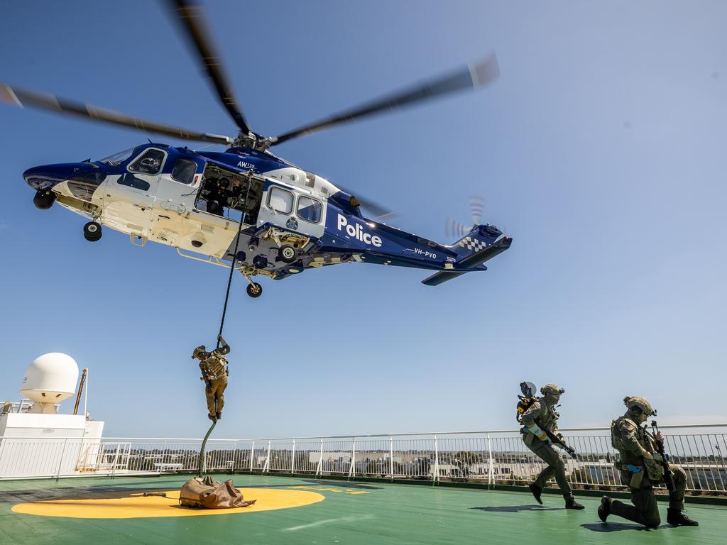 <p>The Special Operations Group (SOG) conducts a high-level training exercise on the Spirit of Tasmania. SOG personal fast rope onto the ship. Picture: Jake Nowakowski</p>