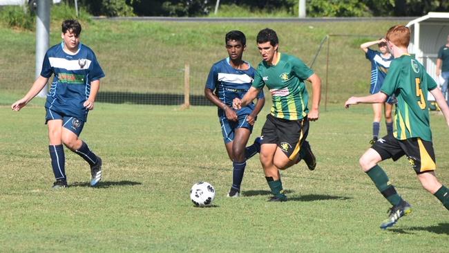 Mackay Lions striker Nicholas Doago pushes forward to score one of three second-half goals against City Brothers Phoenix. Lions won 17-0. Picture: Matthew Forrest