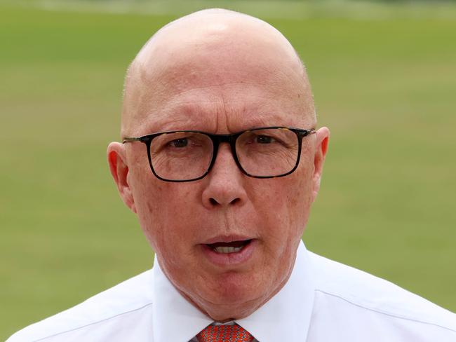 BRISBANE, AUSTRALIA - NewsWire Photos SEPTEMBER 19, 2024: The Leader of the Opposition Peter Dutton speaks to the media during a visit to the Valley District cricket club in Ashgrove. Picture: NewsWire/Tertius Pickard