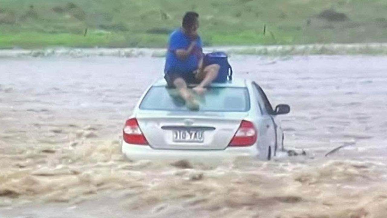 A man stranded on a car near Toowoomba early on Monday.