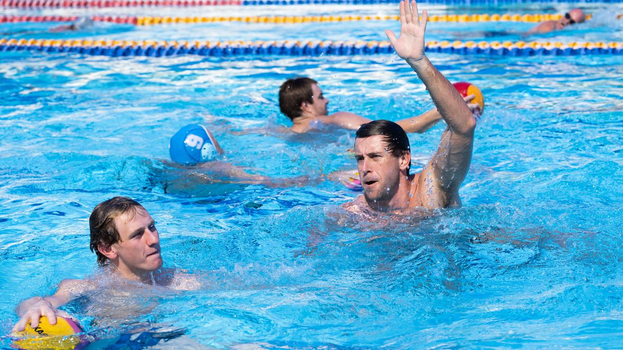 Reef Sharks Team mates Mitch Cameron and James Anstey during a training session at the Woree pool in the lead up to the Water Polo Queensland Country Championships. Picture: Emily Barker