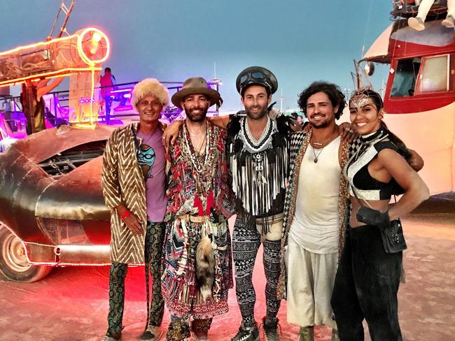 Scott Hutchinson (far left) with his entourage at Nevada's Burning Man festival.