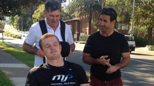 Alex with his father Scott McKinnon and Andrew Johns