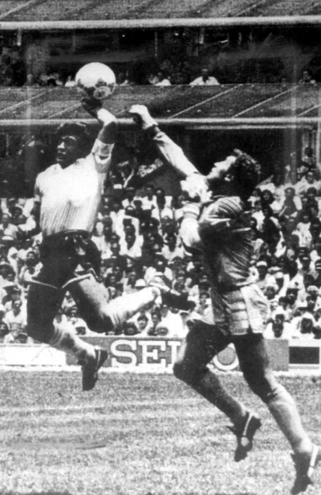 Diego Maradona doing 'the hand of God goal' in 1986.