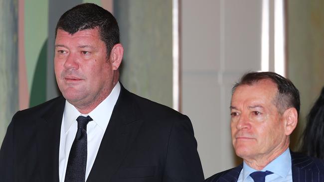 James Packer and John Alexander, the Executive Chairman of Crown Resorts, arrive to attend the Crown Resorts annual general meeting in October last year.