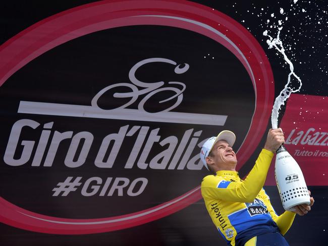 Australia's Michael Rogers celebrates on the podium after winning the 20th stage of the Giro d'Italia.