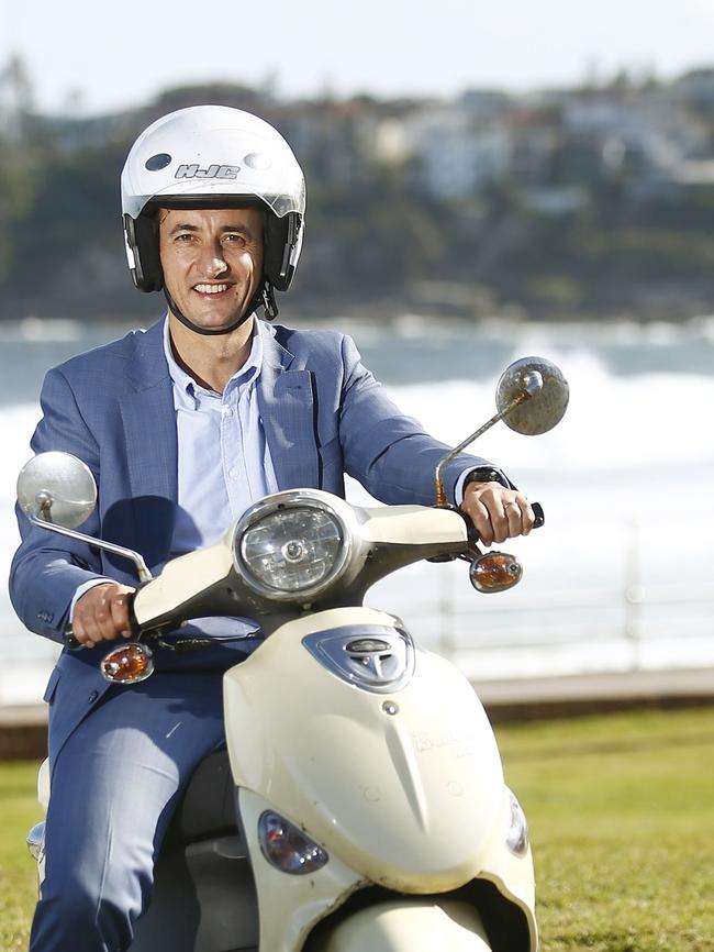 Federal member for Wentworth Dave Sharma on his bike at Bondi Beach. Picture: John Appleyard