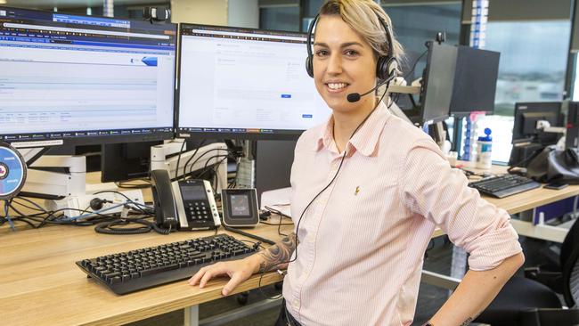 Telstra customer service expert Jess Rogers poses at the Brisbane call centre which requires additional staff. Picture: Richard Walker/AAP