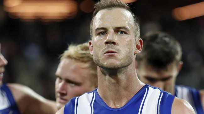 GEELONG, AUSTRALIA - APRIL 18: Josh Walker of the Kangaroos reacts after a loss during the 2021 AFL Round 05 match between the Geelong Cats and the North Melbourne Kangaroos at GMHBA Stadium on April 18, 2021 in Geelong, Australia. (Photo by Dylan Burns/AFL Photos via Getty Images)