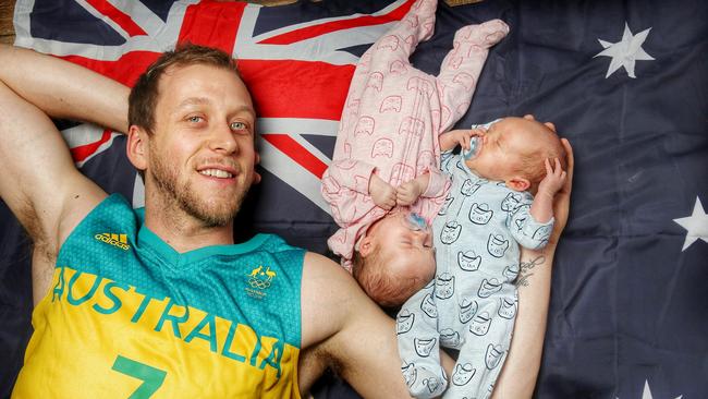 Australian basketballer Joe Ingles with his twins (pink) Milla and (blue) Jacob. Picture: Colleen Petch.