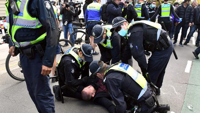 A man is arrested in Melbourne. Picture: AFP