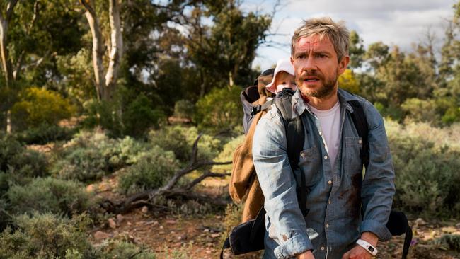 Martin Freeman with baby Rosie in a scene from Australian film Cargo