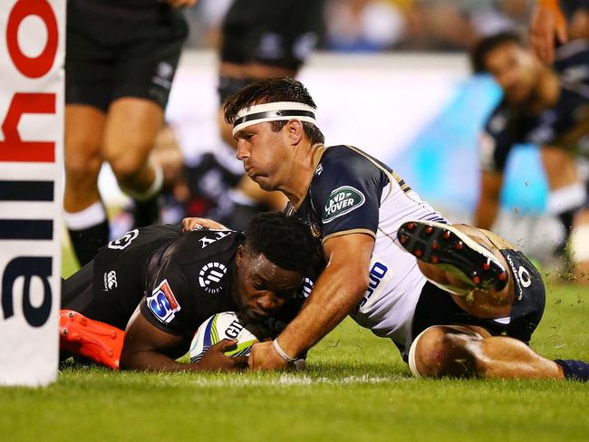 CANBERRA, AUSTRALIA - MARCH 04: Lwazi Mvovo of the Sharks is tackled just short of the line during the round two Super Rugby match between the Brumbies and the Sharks at GIO Stadium on March 4, 2017 in Canberra, Australia. (Photo by Mark Nolan/Getty Images)