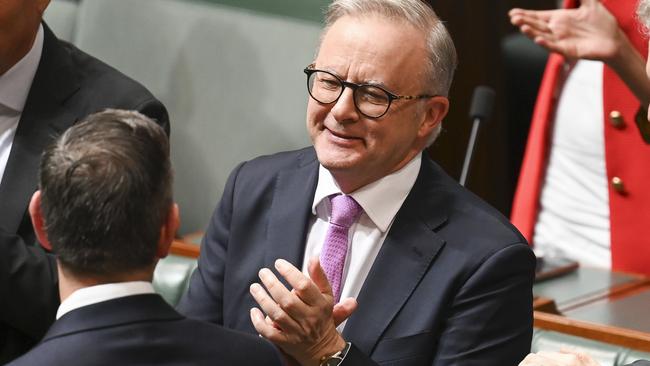 CANBERRA, Australia, NewsWire Photos. May 14, 2024: Prime Minister Anthony Albanese congratulates Federal Treasurer Jim Chalmers after he handed down the 2024-25 Federal Budget at Parliament House in Canberra. Picture: NCA NewsWire / Martin Ollman