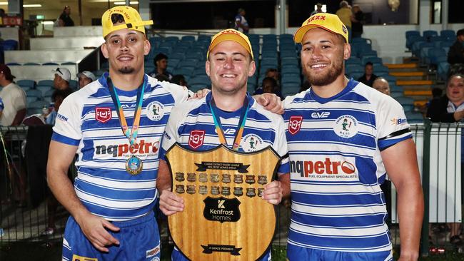 Three times premiership winners Lachlan Biondi-Odo, Tamati Huirama and Jordan Biondi-Odo pose with the FNQRL A grade premiership shield after beating the Ivanhoe Knights 18 points to 14 in the grand final match at Barlow Park. Picture: Brendan Radke