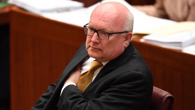 Attorney-General George Brandis responds to Pauline Hanson. Picture: AAP