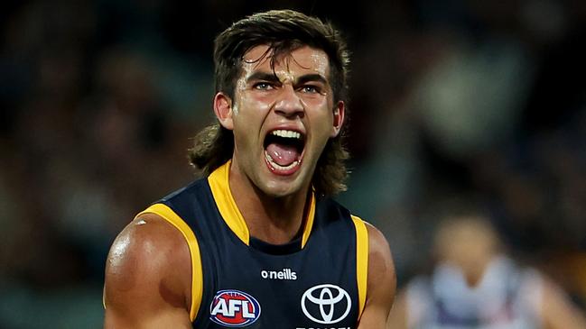 ADELAIDE, AUSTRALIA - APRIL 01: Josh Rachele of the Crows celebrates a goal during the 2023 AFL Round 03 match between the Port Adelaide Power and the Adelaide Crows at Adelaide Oval on April 1, 2023 in Adelaide, Australia. (Photo by James Elsby/AFL Photos via Getty Images)