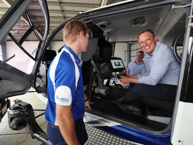 Premier Steven Miles in Townsville with the new Old Police Helicopter at Townsville Airport. With Jake Keir Cam surveillance operator. Pic: Annette Dew