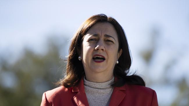 Premier Annastacia Palaszczuk will come under pressure to take more returning international passengers. Picture: News Corp/Attila Csaszar