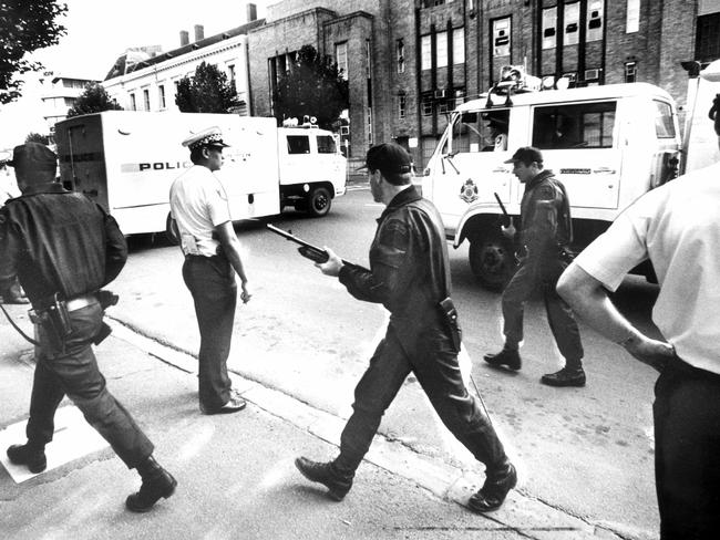 Tight security outside court during the Russell St bombing case.