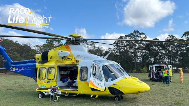 A third person, a man in his 20s, was taken to hospital in an ambulance with abdominal and chest injuries. Picture: RACQ LifeFlight