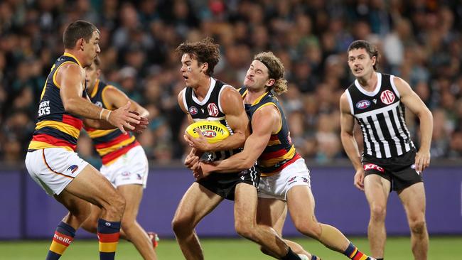 It’s such a big occasion for the two South Australian clubs, Port Adelaide are allowed to wear a special heritage jumper. (Photo by Sarah Reed/AFL Photos via Getty Images)