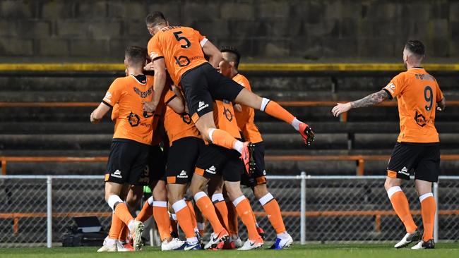 Stefan Mauk of Brisbane celebrates scoring a goal during the FFA Cup Round of 32 match between Sydney FC and the Brisbane Roar at Leichhardt Oval. Picture: AAP Image/Joel Carrett