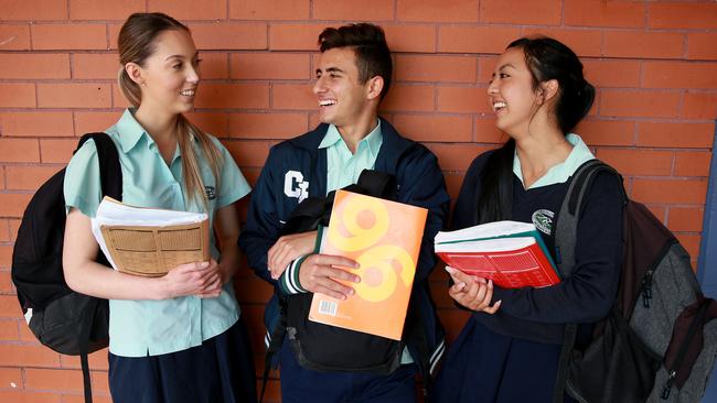 Cecil Hills High School student Olivia Macmillan 18, Jarrod Carluccio 17 and Julina Ngov, 17 are relieved after finishing the exam. Picture: Toby Zerna