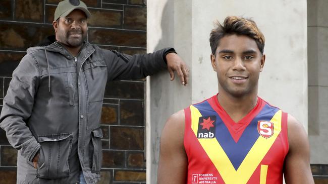 TOP PROSPECT: SA AFL draft prospect Kysaiah Pickett (right) with his famous uncle Byron Pickett. Picture: DEAN MARTIN (AAP).