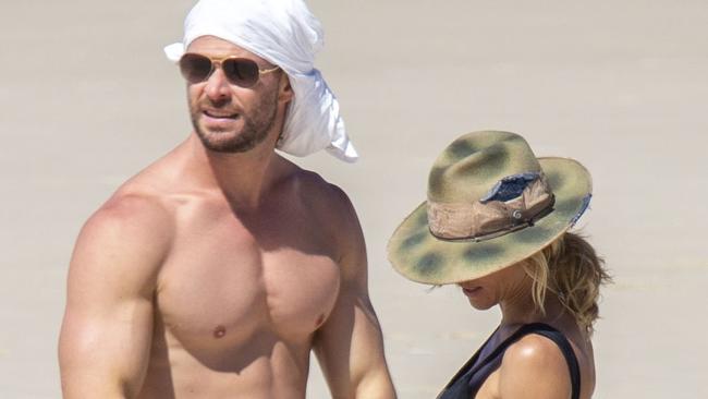 Chris Hemsworth on the beach with his wife Elsa Pataky. Picture: MEDIA MODE