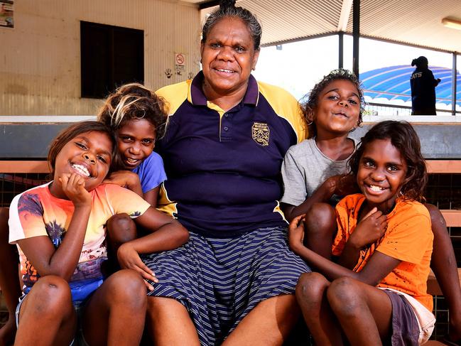 Senior teacher Michelle Bennett with students from the Minyerri School, 480km from Darwin. Michelle says Kerri-Anne is right, "Of course kids are the most important issue". Picture: Justin Kennedy