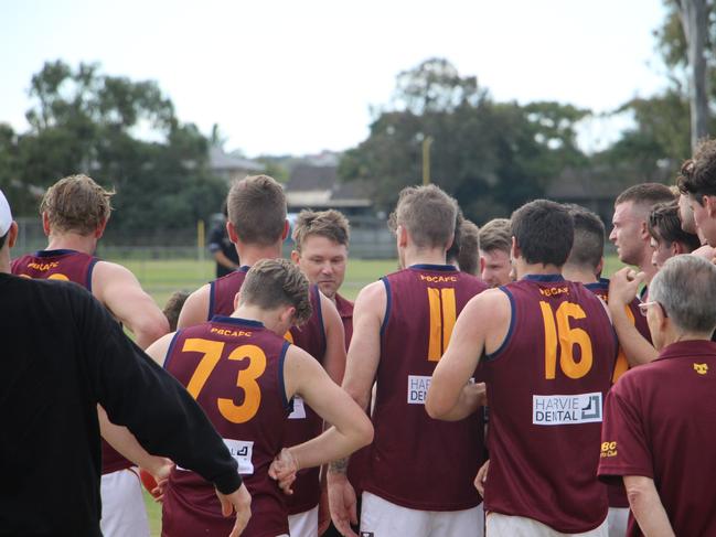 Palm Beach Currumbin coach Jess Sinclair talking to his players during the break in their Round 1 QAFL game against Surfers Paradise. Picture credit: AFL.