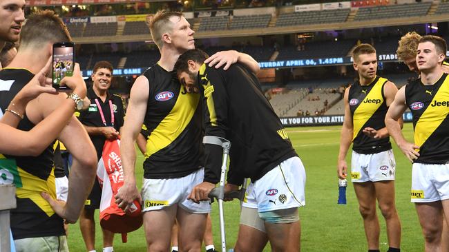 Jack Riewoldt comforts Alex Rance after his ACL injury in Round 1. Picture: AAP Image/Julian Smith.