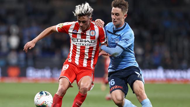 Lachlan Wales and Joel King compete for the ball during the 2020 A-League decider.