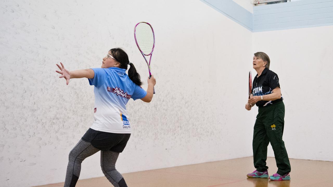 Coach Robyn Prentice (right) offers some skill advice to Larrissa Gao during the Southern Region Junior Squash Camp at Toowoomba Squash.