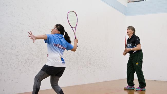 Coach Robyn Prentice (right) offers some skill advice to Larrissa Gao during the Southern Region Junior Squash Camp at Toowoomba Squash.