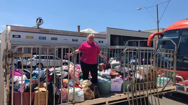 Share the Dignity volunteer Julie Unwin with the huge anonymous donation from one Merry Muster shopper.