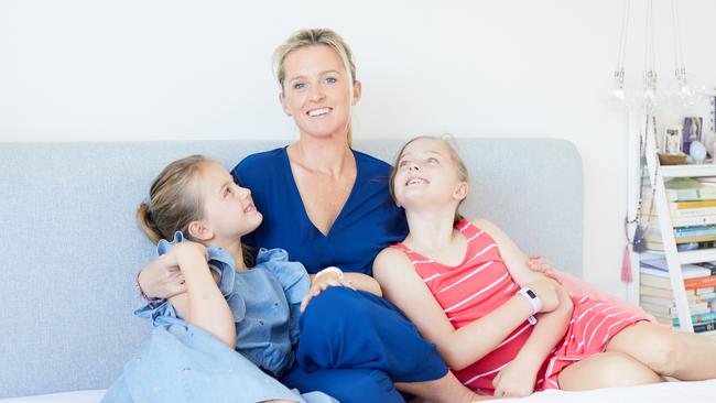 Author and yoga teacher Tina Bruce at home with daughters Leila Bruce, 9, and Zoe, 8. Picture: Prue Aja