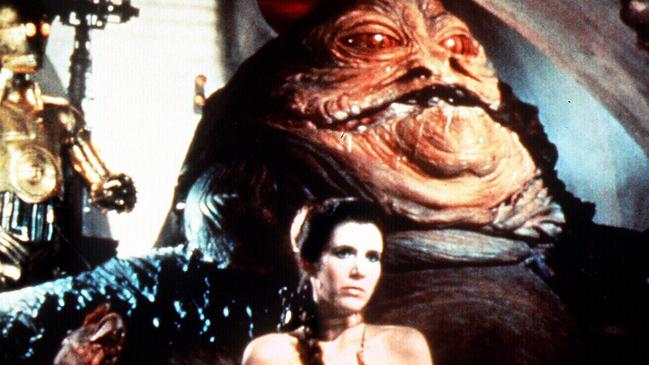 Actor Carrie Fisher and Jabba the Hutt character from Star Wars trilogy Return of the Jedi. /Films/Titles/Return/of/the/Jedi