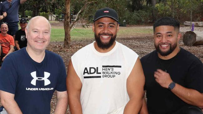 ADELAIDE, SOUTH AUSTRALIA - Advertiser Photos April 19, 2025 - Adelaide Men's Walking group, founders Matthew McCurry, Timani and John Seve, in the foreground of a group of the clubs walkers at Thorndon Park Reserve. Newton. Picture: Emma Brasier