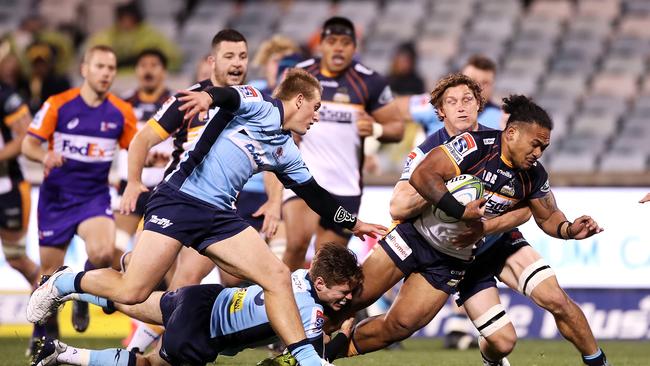 Solomone Kata of the Brumbies is tackled during the round eight Super Rugby AU match between the Brumbies and Waratahs at GIO Stadium on Saturday. Picture: Getty Images