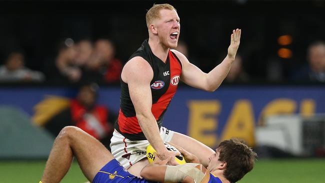 Josh Green questions the umpire after being tackled by Andrew Gaff of the Eagles during the round 14 AFL match between the West Coast Eagles and the Essendon Bombers at Optus Stadium on June 21, 2018 in Perth, Australia. Picture: PAUL KANE/GETTY IMAGES