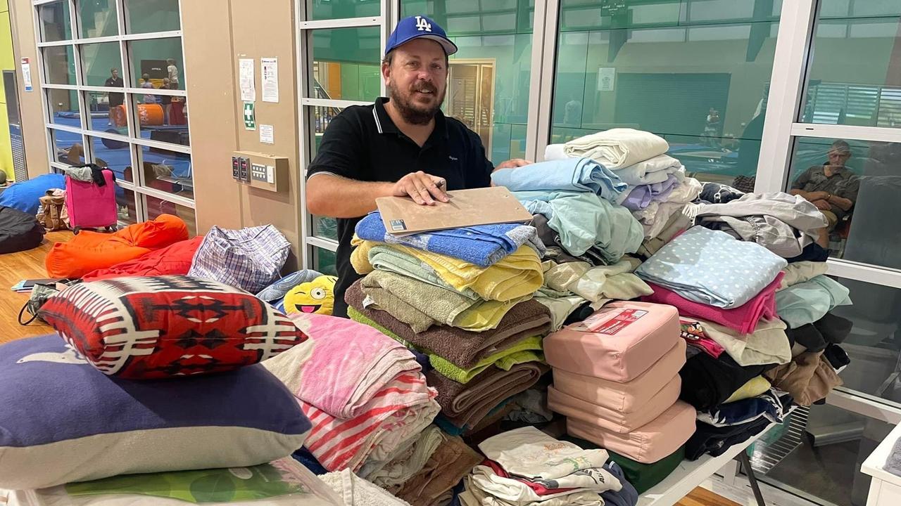 Pastor Jas Van Veen helping flood-stranded travellers at Bowen PCYC, January 2023. Photo: Contributed