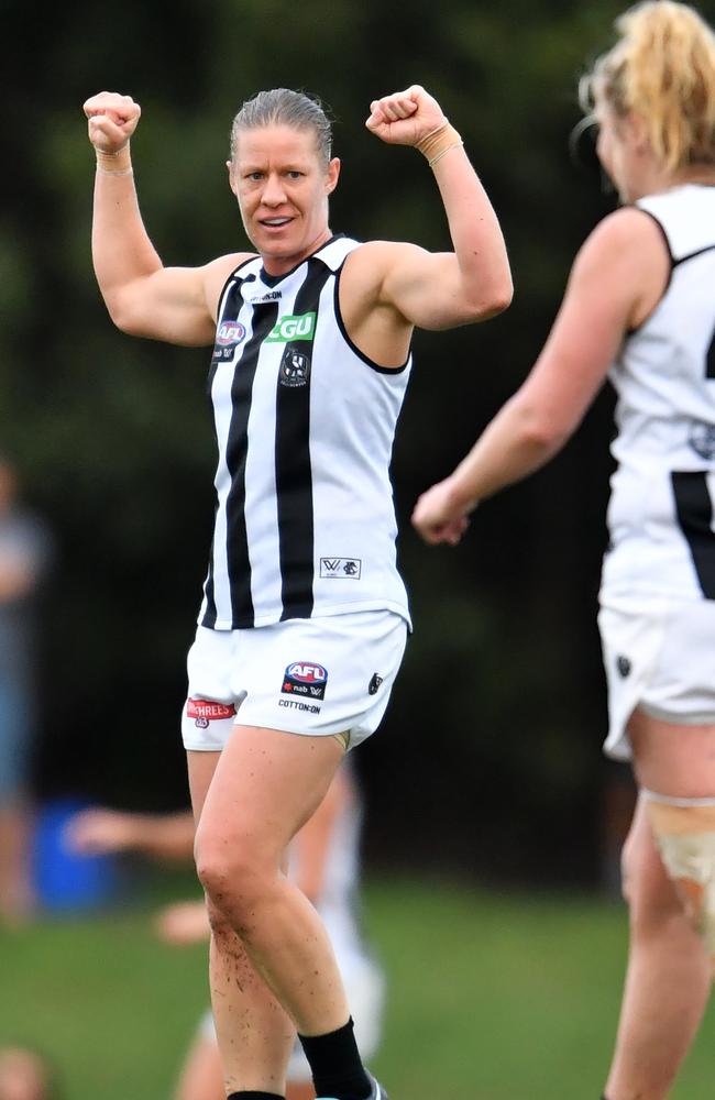 Meg Hutchins celebrating a Collingwood AFLW victory.